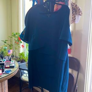 It is peacock blue brand new dress.